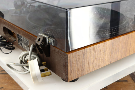 Rear left corner of a used Rotel RP-3000 Turntable W/ SME 3009 Series II Improved Tonearm