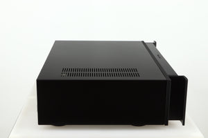 Left side view of a used Rotel RSP-1066 Pre Amplifier / Processor in a black finish