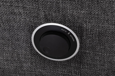 Close up of a used Ruark MRX Streaming Speaker showing control knob 