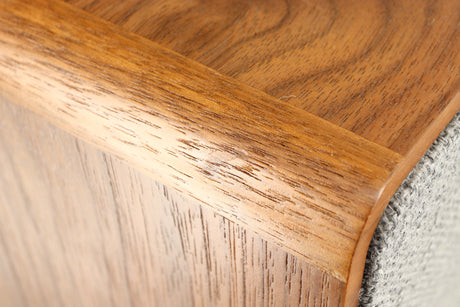 Close up of a used Ruark MRX Wireless Speaker in a walnut finish showing small blemish on left edge