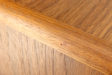 Close up of a used Ruark MRX Wireless Speaker in a walnut finish showing small blemish on right edge