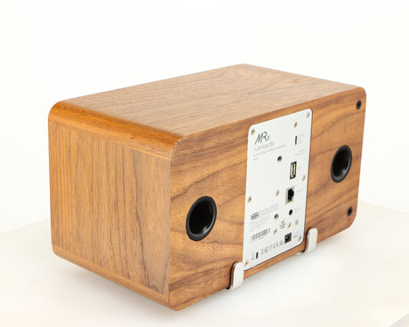 Rear right corner of a used Ruark MRX Wireless Speaker in a walnut finish