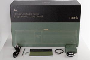 Box of a used Ruark R410 Integrated Music System in Fused Walnut with mains cable, manual, remote, USB-C cable, and antenna