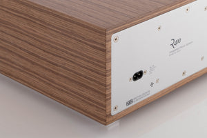 Rear left corner view of a used Ruark R410 Integrated Music System in Fused Walnut
