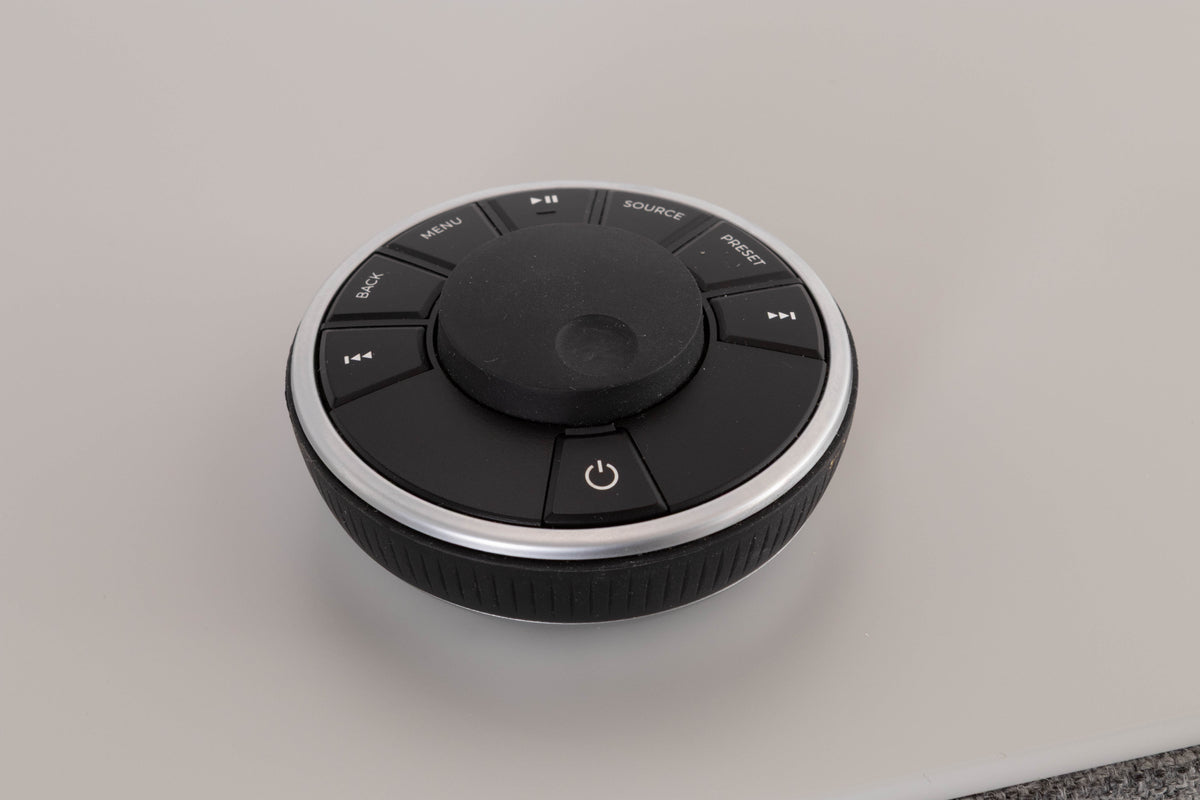 Remote of a used Ruark R5 Music System in Soft Grey