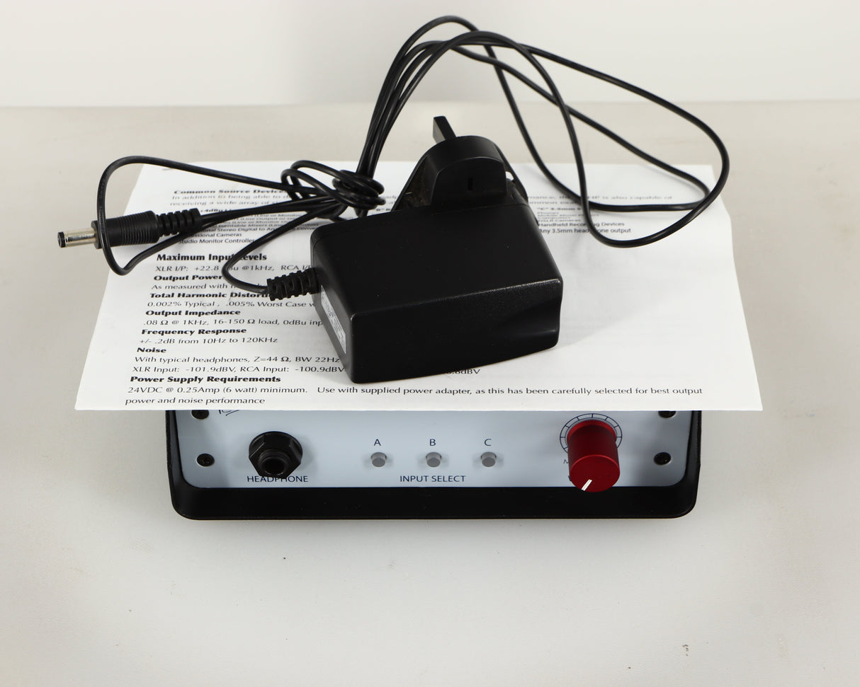 Top of a used Rupert Neve Designs RNHP Precision Headphone Amplifier showing Manual and Power Cable