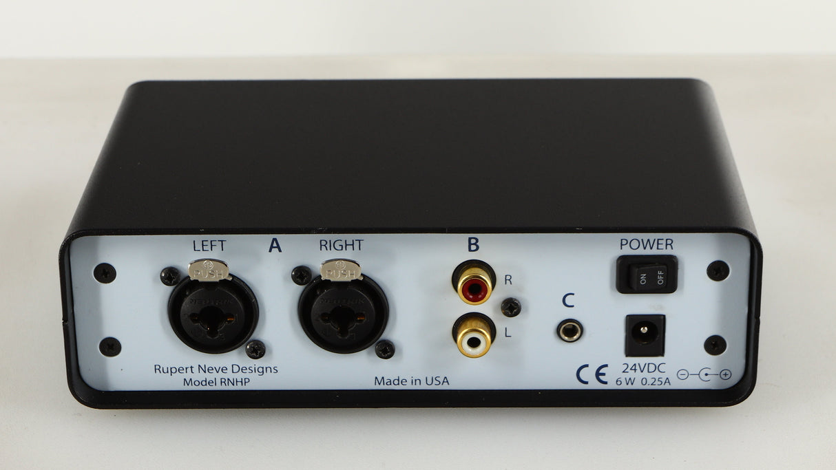 Rear view of a used Rupert Neve Designs RNHP Precision Headphone Amplifier showing Power Input and Phono Outputs