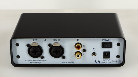 Rear view of a used Rupert Neve Designs RNHP Precision Headphone Amplifier showing Power Input and Phono Outputs