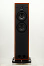 Front view of a used Russell K Red 150SE Floorstanding Speaker in Walnut finish