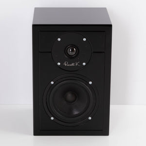 Front view of a used Russell K RED50 Standmount Speaker in a Piano Black finish