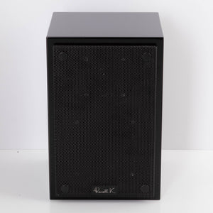 Front view of a used Russell K RED50 Standmount Speaker in a Piano Black finish showing Grille