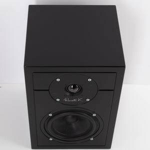 Top of a used Russell K RED50 Standmount Speaker in a Piano Black finish