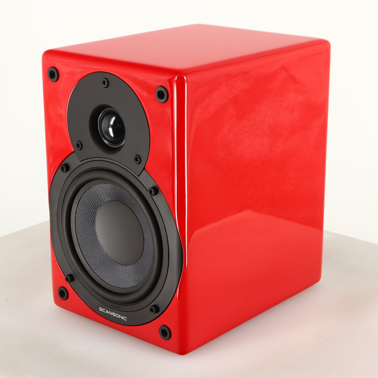Front right corner of a used Scansonic S5 BT Active Bluetooth Standmount Speakers in a red finish