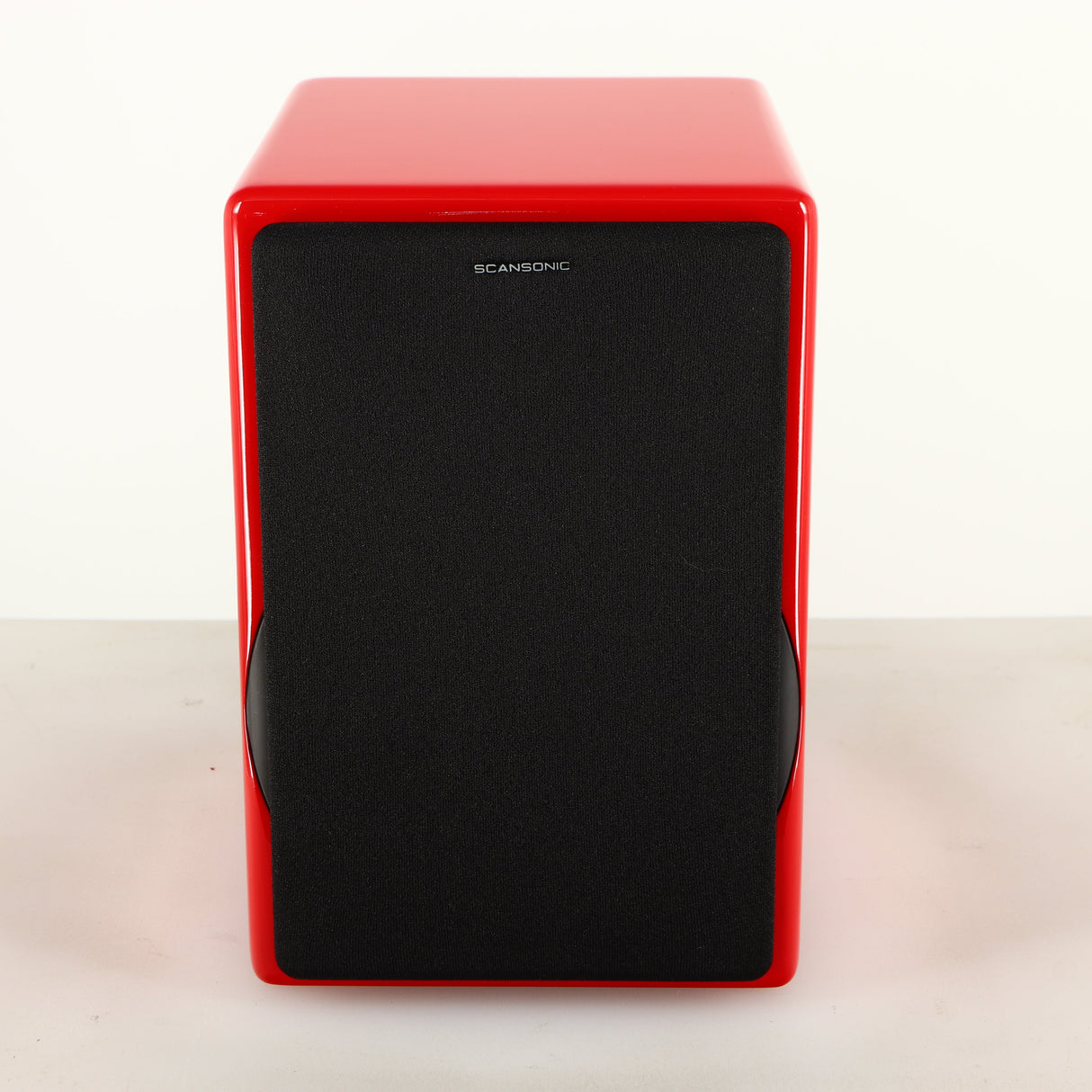 Front view of a used Scansonic S5 BT Active Bluetooth Standmount Speakers in a red finish showing Grille