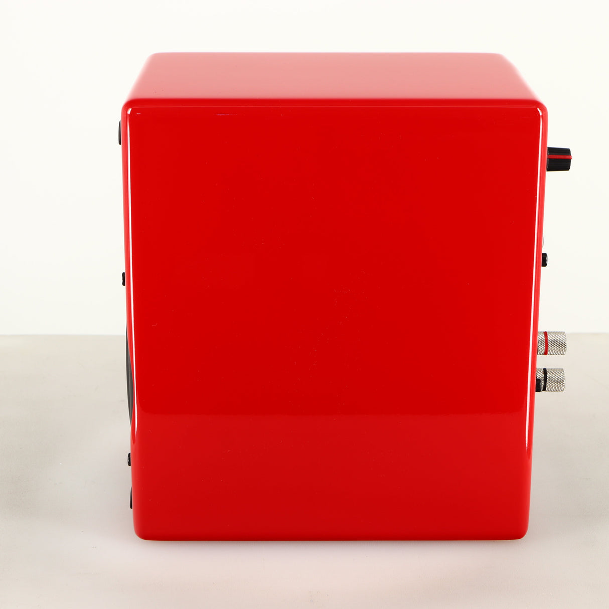 Right side view of a used Scansonic S5 BT Active Bluetooth Standmount Speakers in a red finish