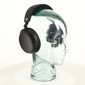 Front left angle of used Sennheiser Momentum 4 Wireless Headphones in a black finish