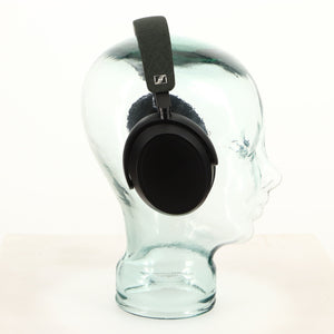 Left side view of used Sennheiser Momentum 4 Wireless Headphones in a black finish