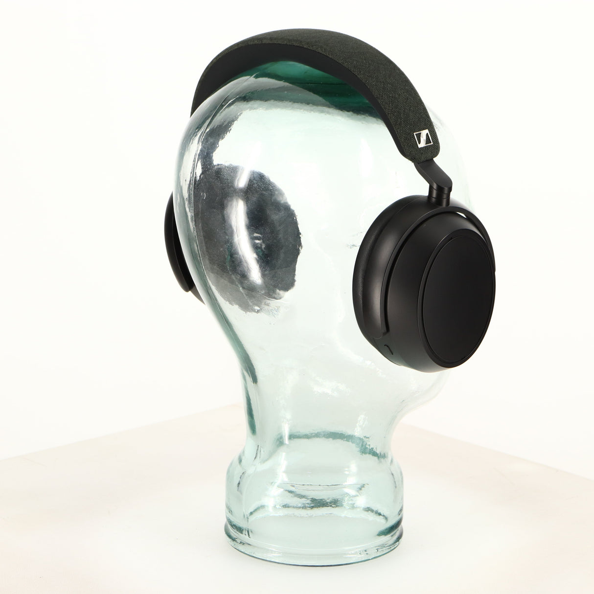 Rear left angle of used Sennheiser Momentum 4 Wireless Headphones in a black finish