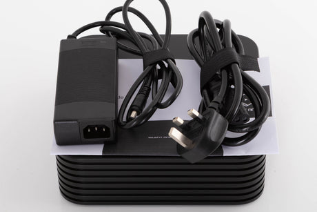 Top of a used Silent Angel Rhein Z1 Plus Streamer in a Black finish showing Mains Cable, PSU and Manual