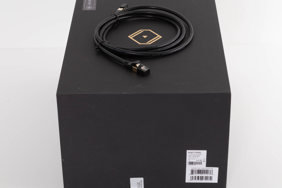 Box for a used Silent Angel Rhein Z1 Plus Streamer in a Black finish showing Ethernet Cable