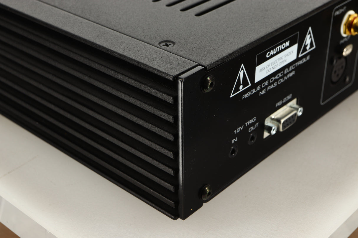 Rear left corner view of a used Sim Audio Moon 330A Power Amplifier in Black finish