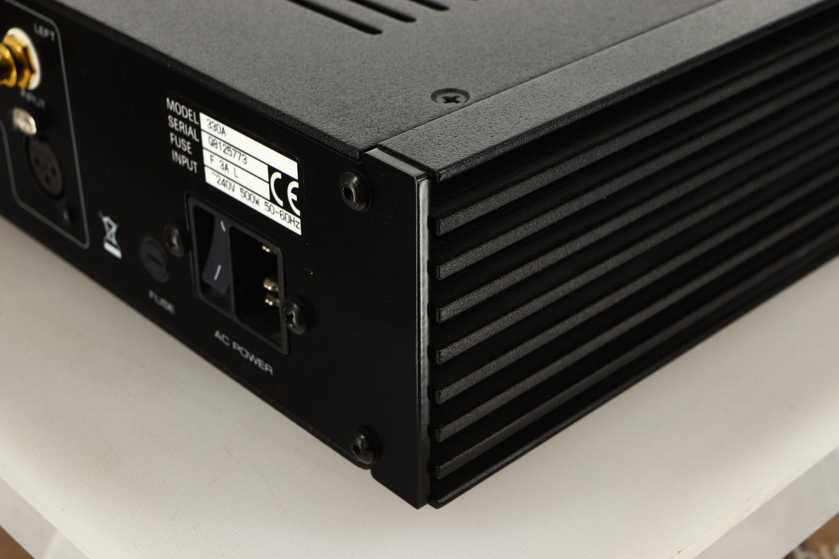 Rear right corner view of a used Sim Audio Moon 330A Power Amplifier in Black finish