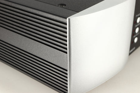Close up of a used Simaudio Moon 260D CD Player in a black / silver finish showing small scratch on left side