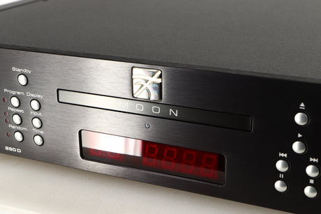 Close up of a used Simaudio Moon 260D CD Player in a black / silver finish showing scratching on screen