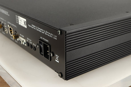 Rear left corner of a used Simaudio Moon 260D CD Player in a black / silver finish
