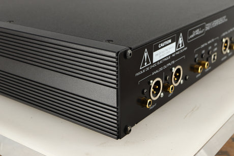 Rear right corner of a used Simaudio Moon 260D CD Player in a black / silver finish