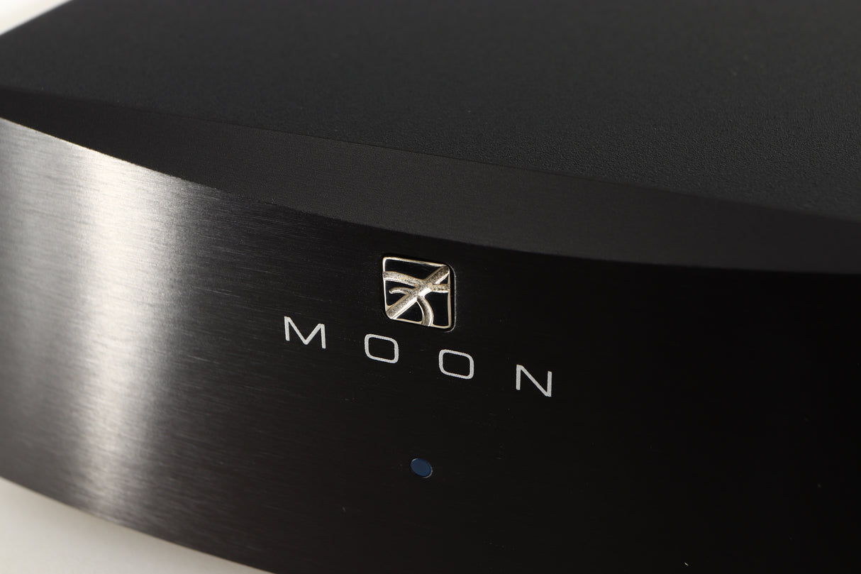 Close up of a used Simaudio Moon 310LP Phono Pre Amplifier in a black finish showing logo on fascia