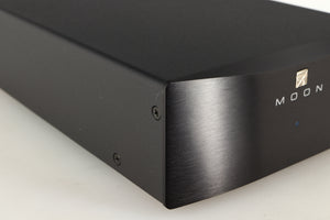 Front left corner of a used Simaudio Moon 310LP Phono Pre Amplifier in a black finish