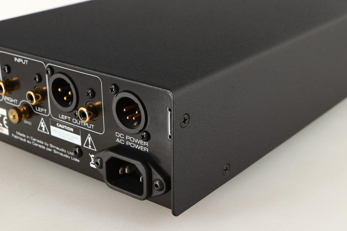 Rear left corner of a used Simaudio Moon 310LP Phono Pre Amplifier in a black finish