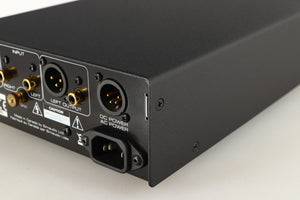 Rear left corner of a used Simaudio Moon 310LP Phono Pre Amplifier in a black finish