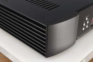 Front left corner of a used Simaudio Moon 340i D3PX Integrated Amplifier in a black finish