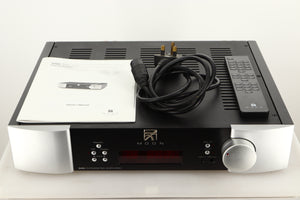 A used SimAudio Moon 340i X Integrated Amplifier in Black/Silver finish with mains cable, manual, and remote
