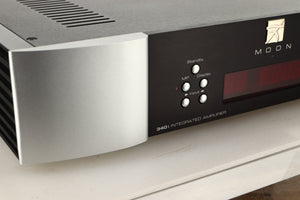 Close up view of a used SimAudio Moon 340i X Integrated Amplifier in Black/Silver finish