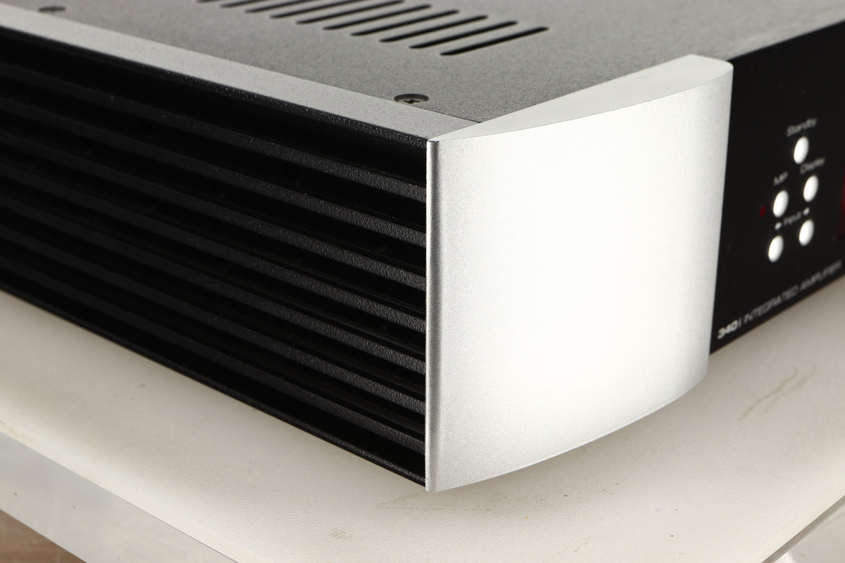 Front left corner view of a used SimAudio Moon 340i X Integrated Amplifier in Black/Silver finish