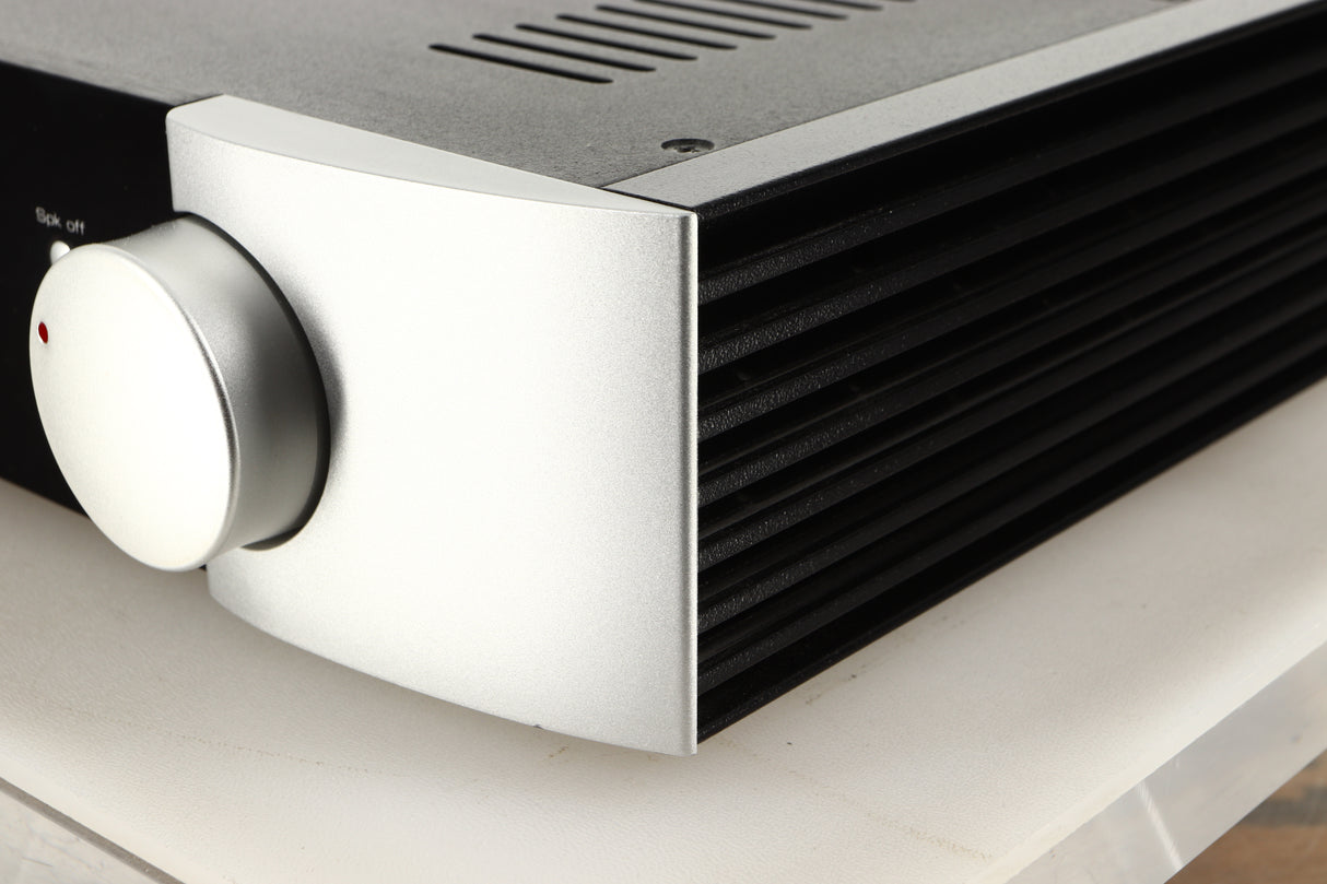 Front right corner view of a used SimAudio Moon 340i X Integrated Amplifier in Black/Silver finish