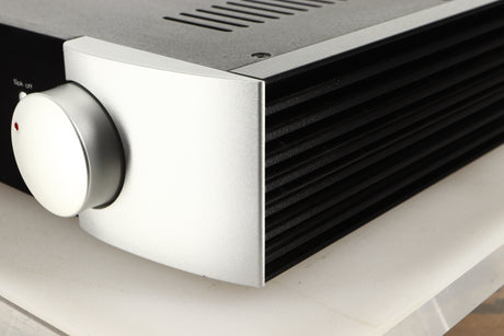 Front right corner view of a used SimAudio Moon 340i X Integrated Amplifier in Black/Silver finish