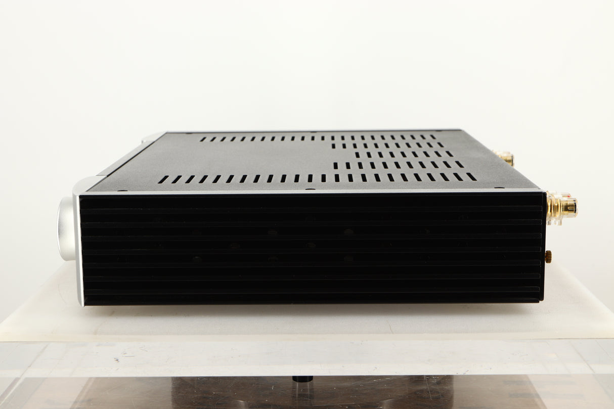 Side view of a used SimAudio Moon 340i X Integrated Amplifier in Black/Silver finish