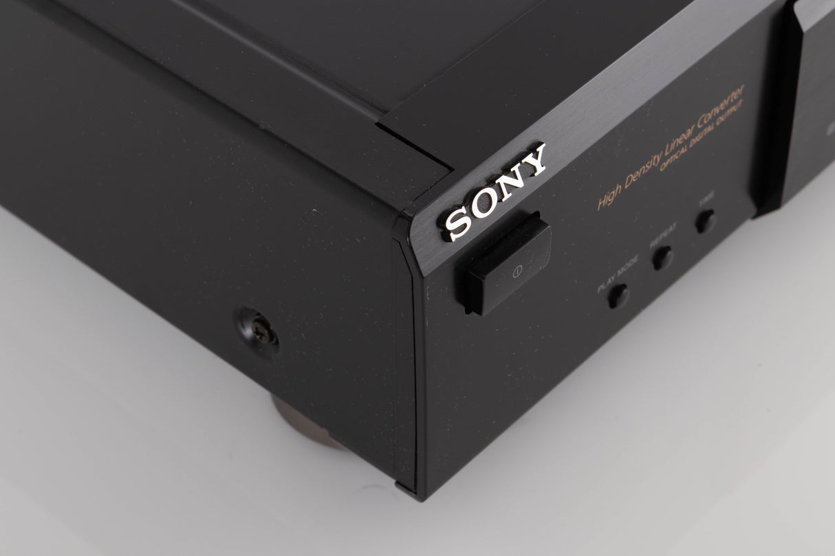 Front left corner of a used Sony CDP-XE330 CD Player in a Black finish