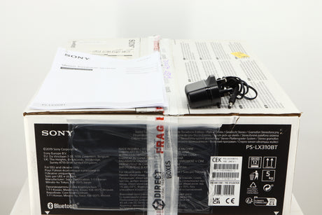 Box for a used Sony PS-X301BT/C Turntable in a black finish showing PSU and Manual