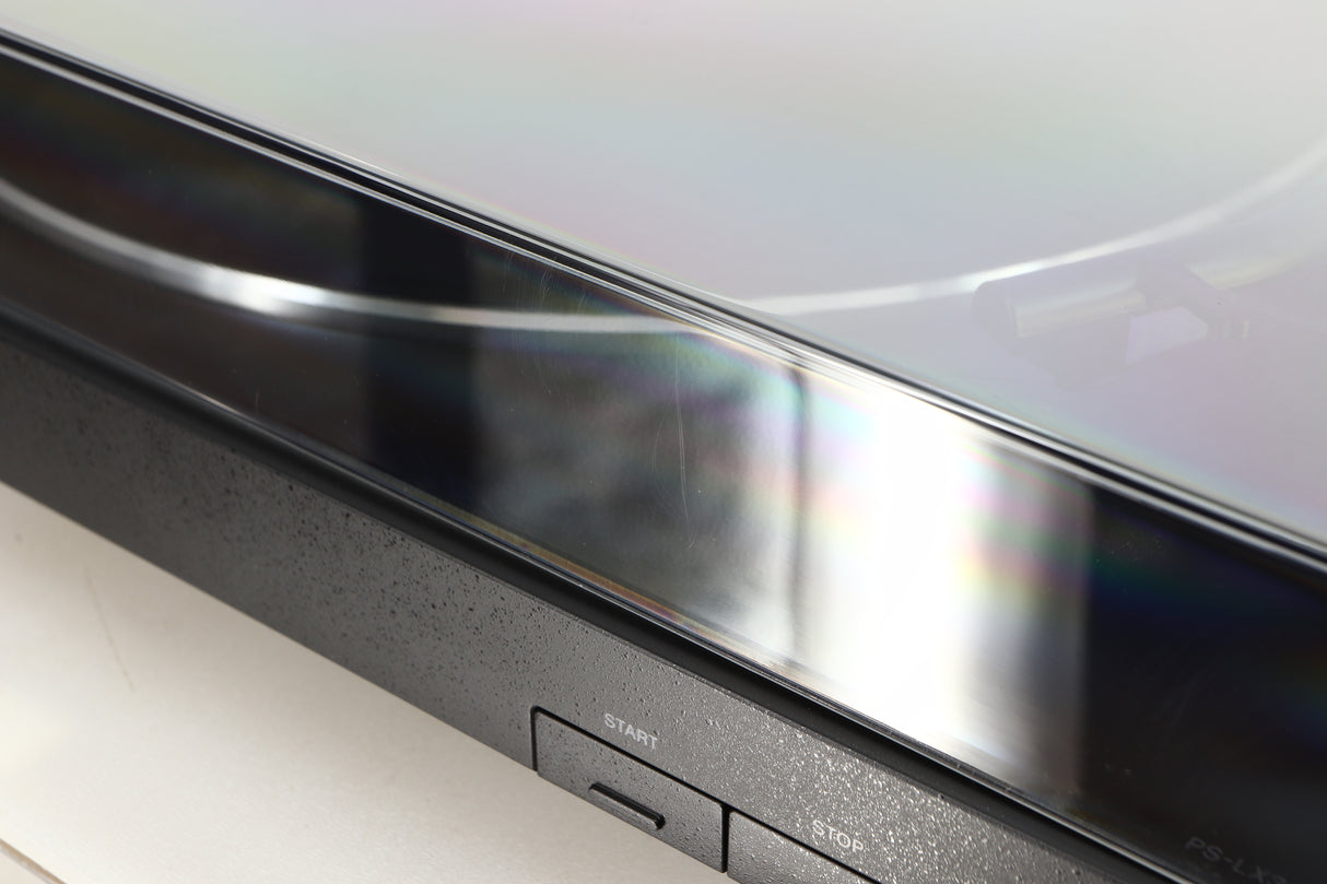 Close up of a used Sony PS-X301BT/C Turntable in a black finish showing scratch on lid