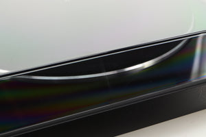 Close up of a used Sony PS-X301BT/C Turntable in a black finish showing scratch on lid