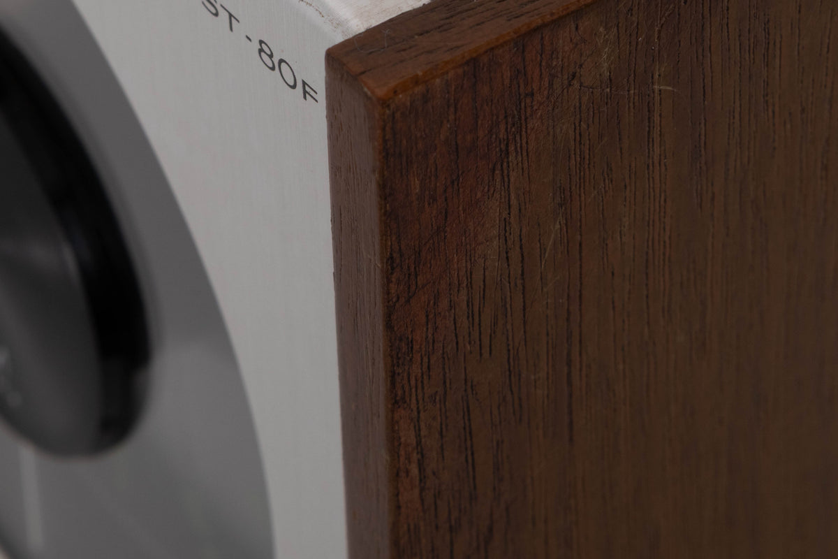 Close up of a used Sony ST-80F Tuner showing scratching on right side