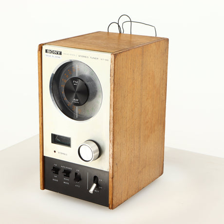 Front right corner of a used Sony ST-88 Tuner in an oak finish 