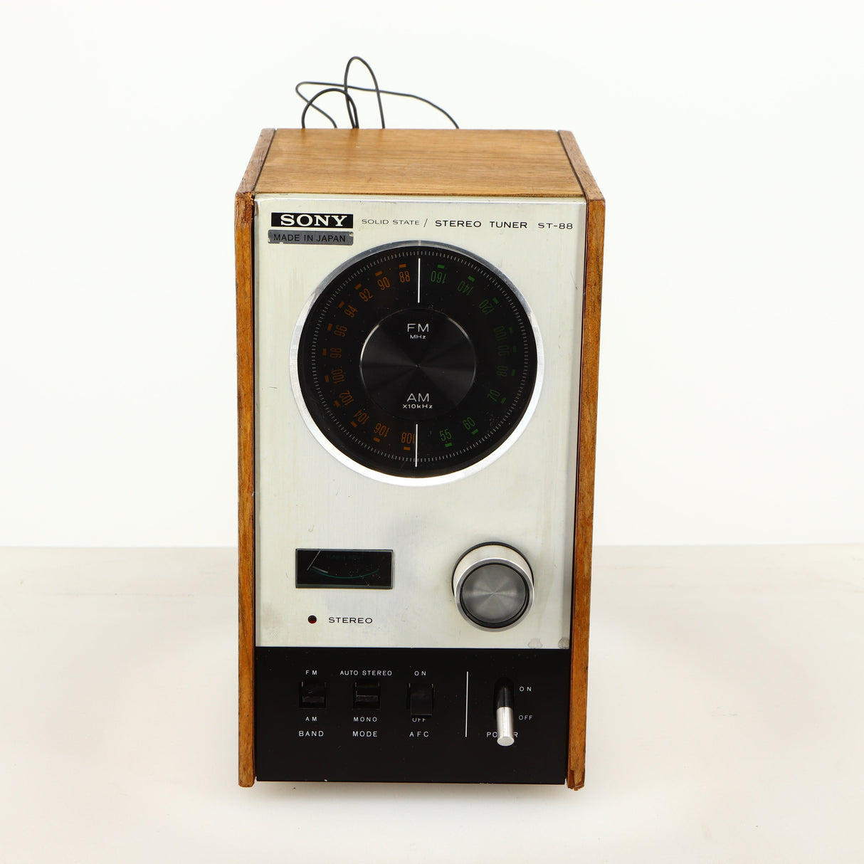 Front view of a used Sony ST-88 Tuner in an oak finish 