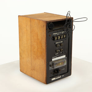 Rear right corner of a used Sony ST-88 Tuner in an oak finish 
