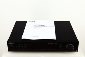 Top of a used Sony ST-S570ES FM/AM Tuner in a black finish showing Manual